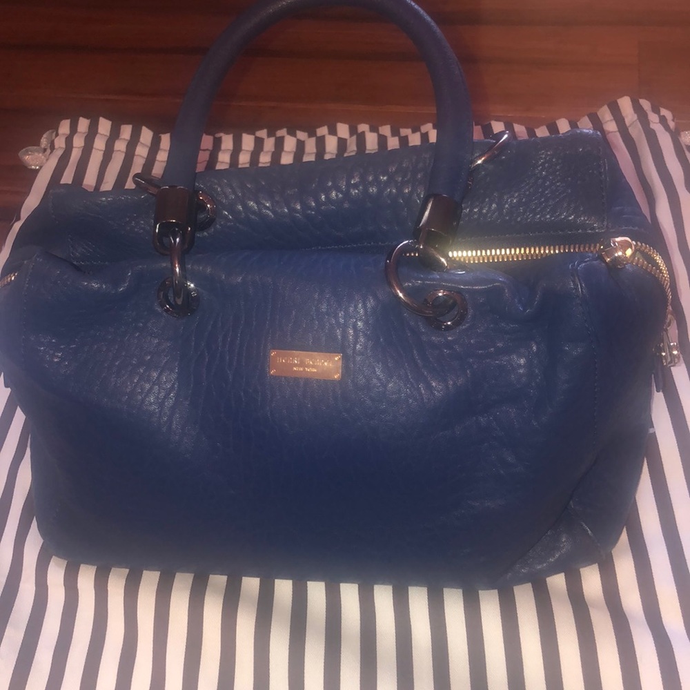 Gently used Henri Bendel handbag, blue.